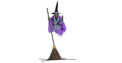12 foot witch floating in mid air